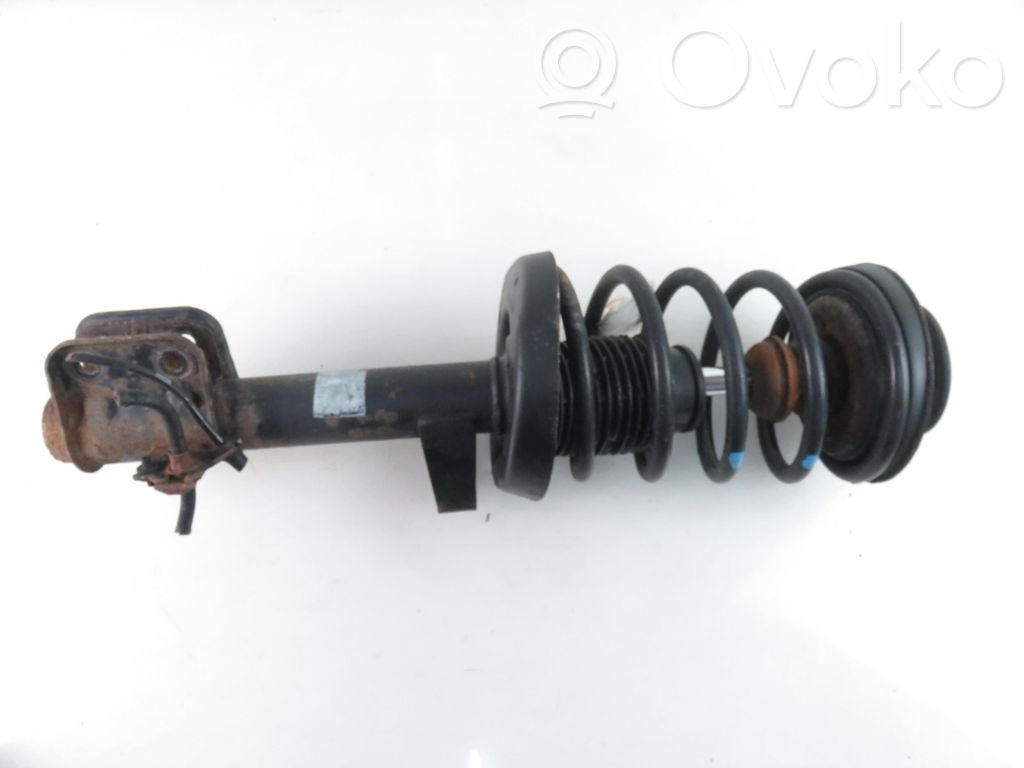 Front shock absorber with coil spring
