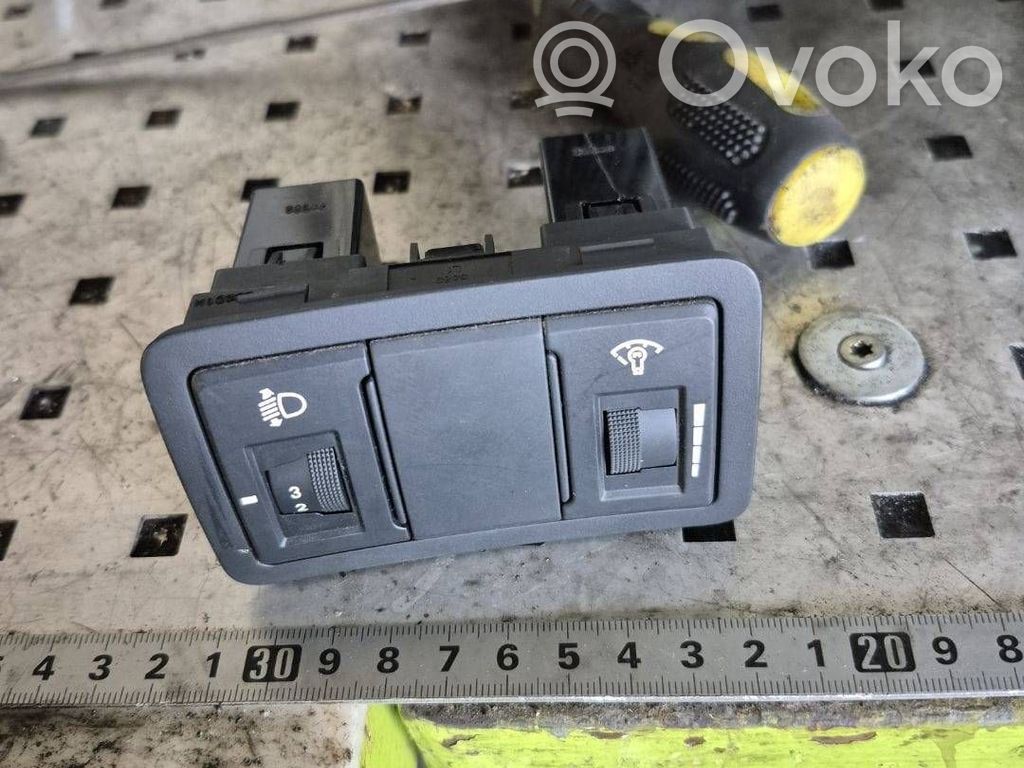 Headlight level height control switch