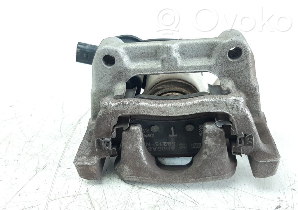 Hyundai Tucson TL Supporto della pinza del freno posteriore