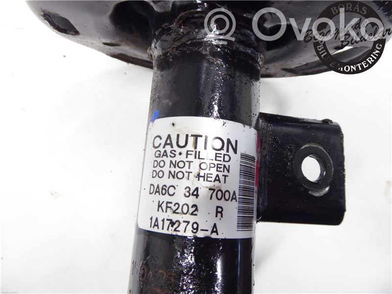 Mazda 2 Front shock absorber with coil spring 