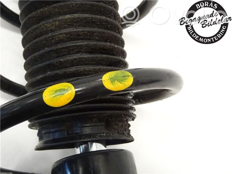 Mazda 3 III Front shock absorber with coil spring 