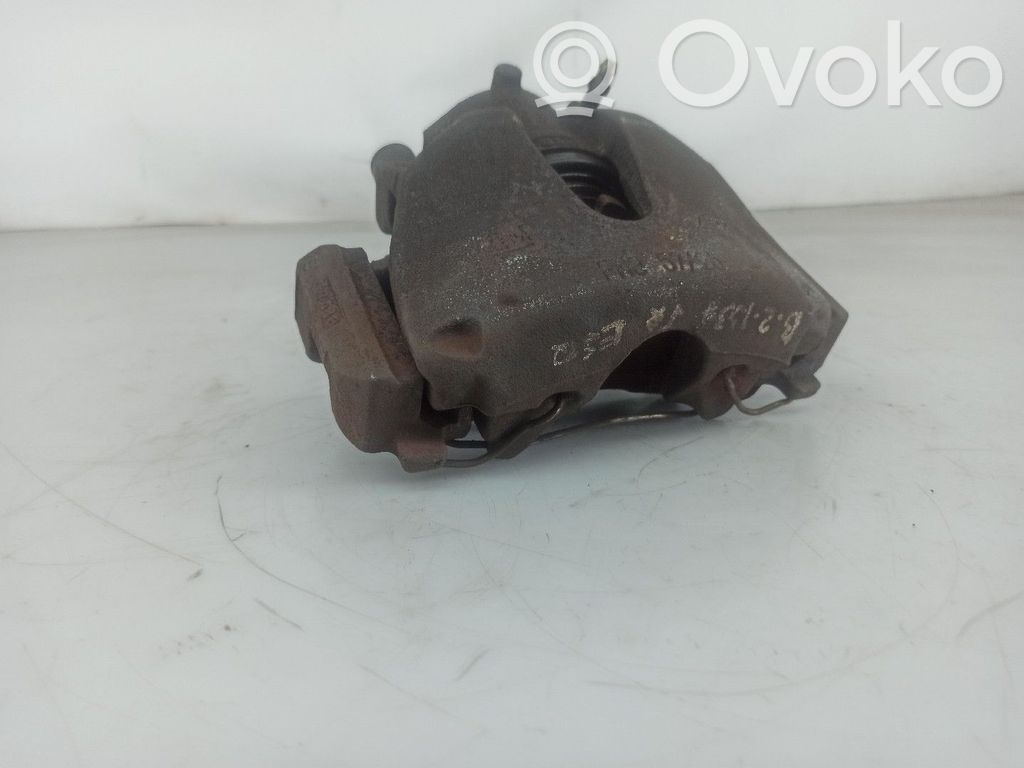 Opel Astra G Zacisk hamulcowy przedni 