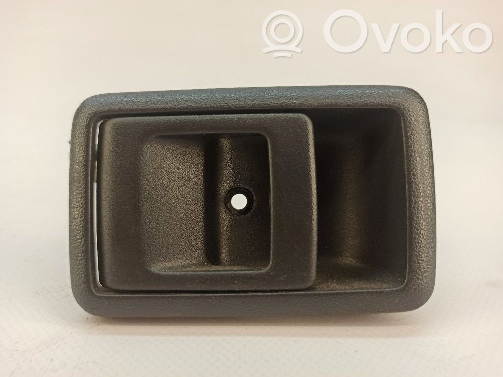 Manecilla externa puerta trasera   NV