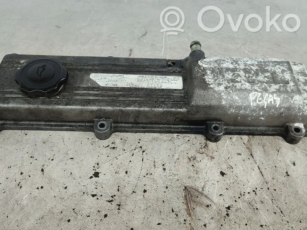 Cache culbuteur