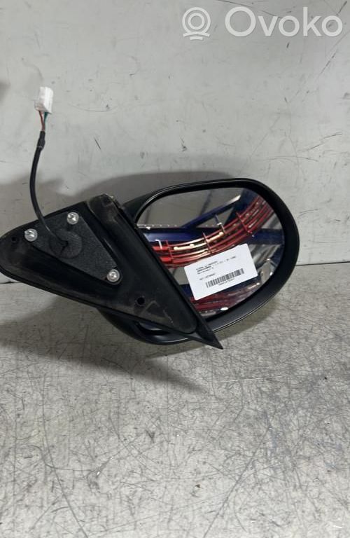 Nissan Juke I F15 Espejo lateral manual