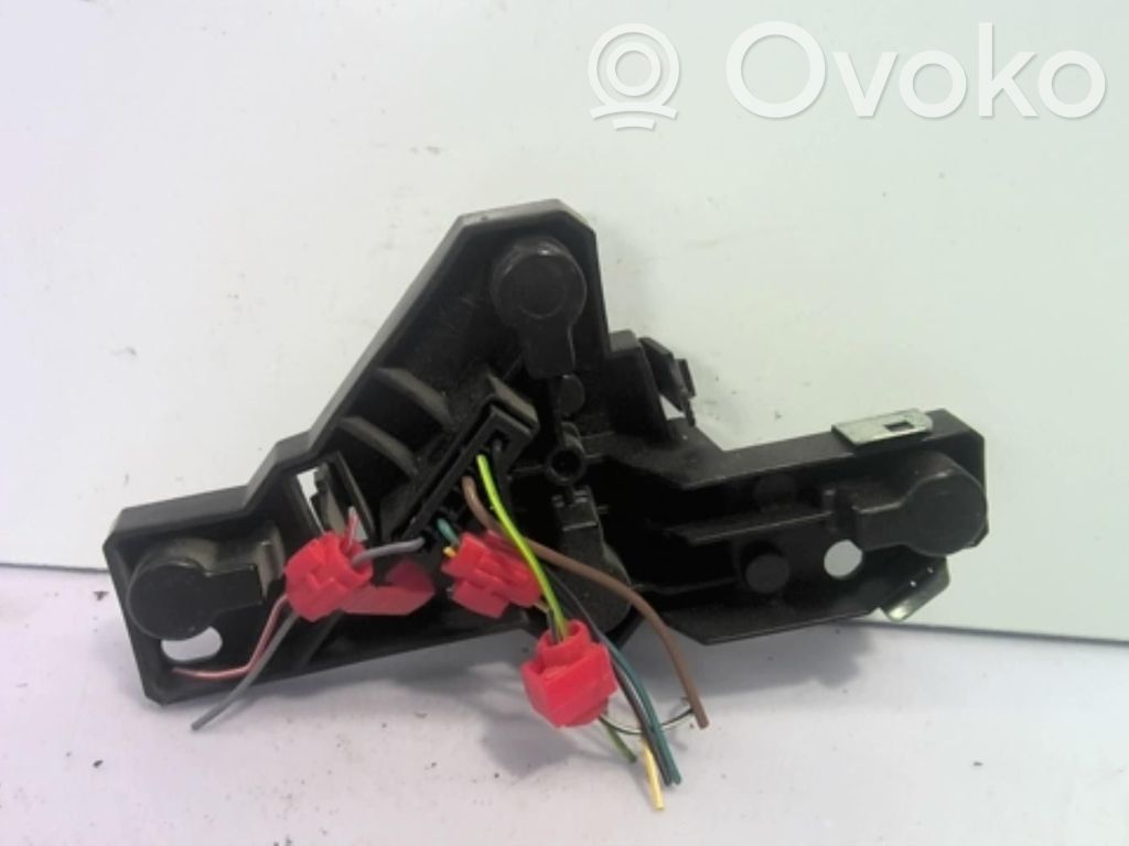 Tail light bulb cover holder