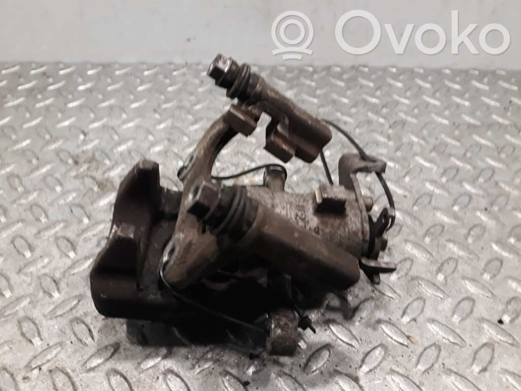 Renault Megane III Supporto della pinza del freno posteriore 