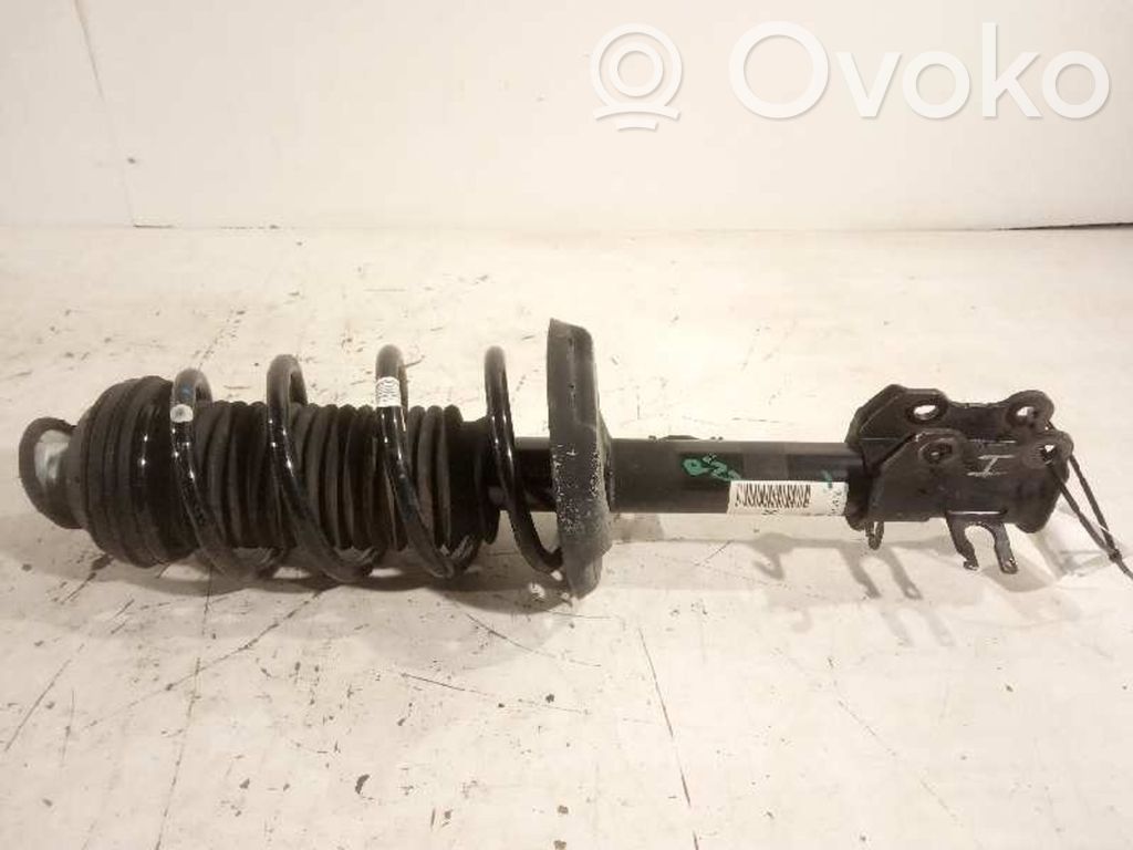 Opel Corsa D Amortyzator osi przedniej ze sprężyną 