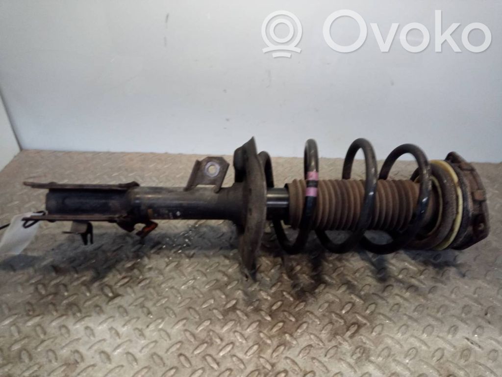 Nissan Qashqai+2 Amortyzator osi przedniej ze sprężyną 