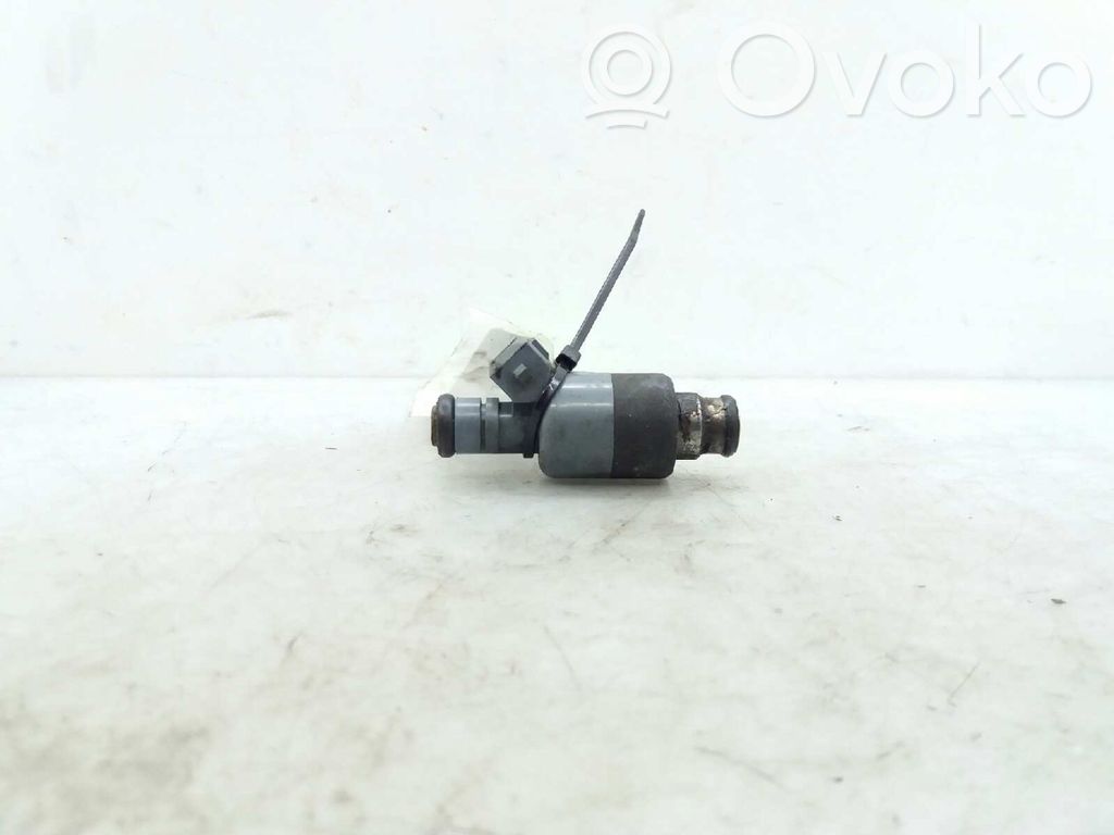 Inyector de combustible
