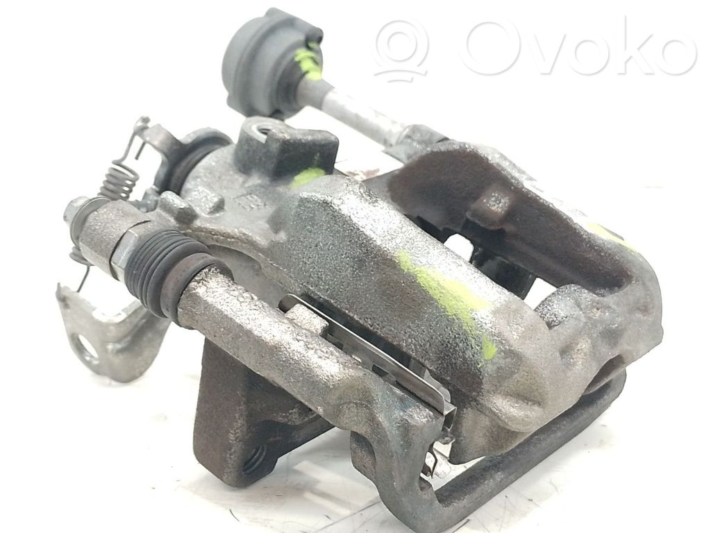 Opel Astra J Caliper del freno trasero 