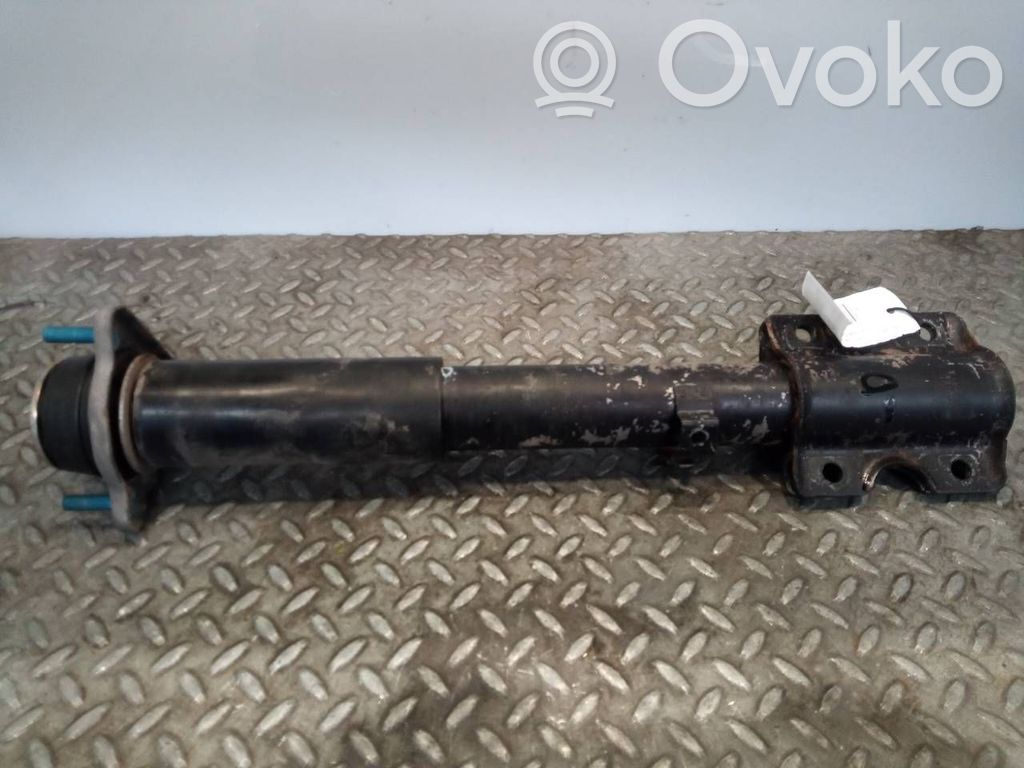 Front shock absorber with coil spring