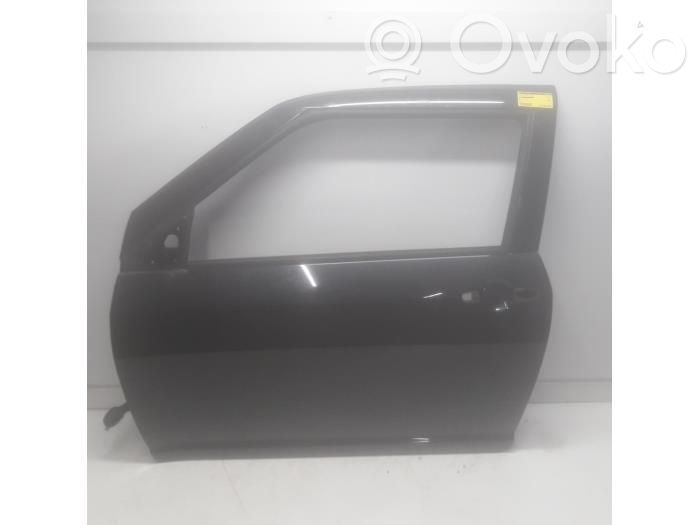 Suzuki Swift I Front door 