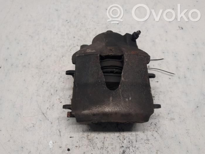 Seat Leon (1P) Zacisk hamulcowy przedni 