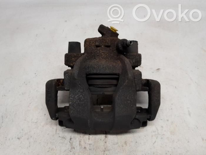 Renault Clio IV Zacisk hamulcowy przedni 