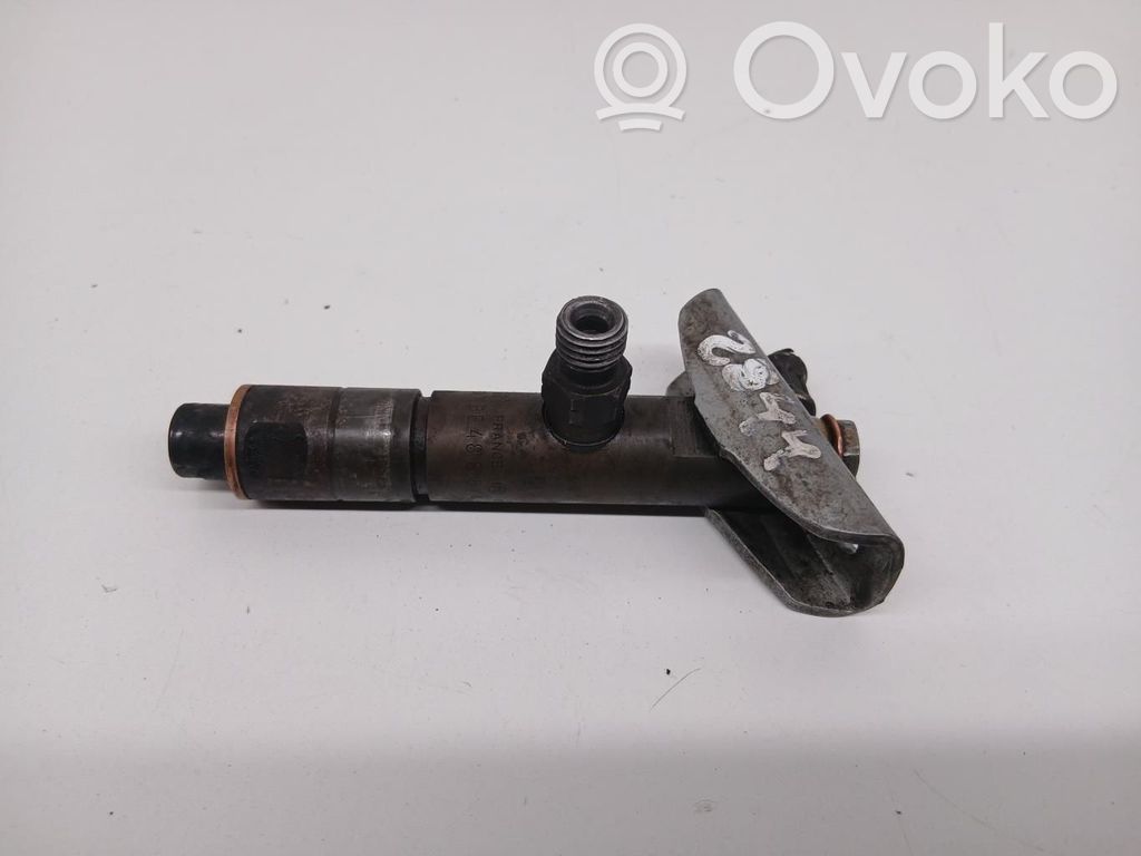 Inyector de combustible