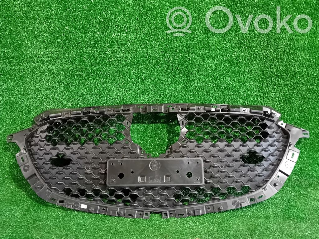 Mazda 2 Front bumper upper radiator grill 