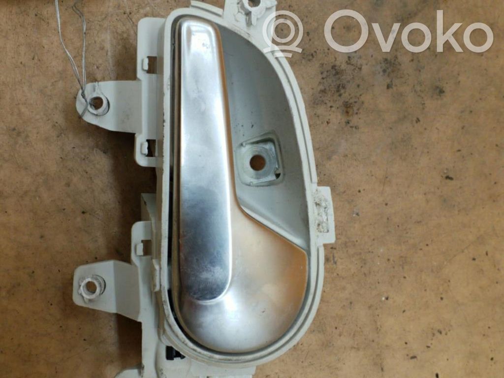 Manecilla interna puerta delantera