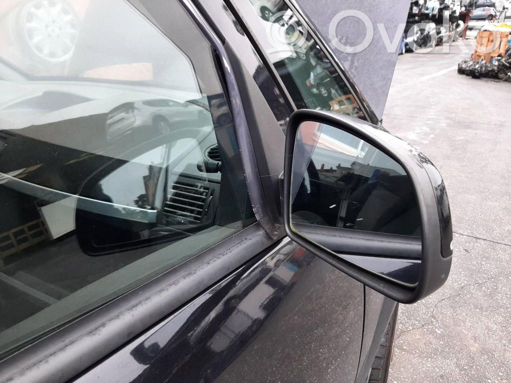 Espejo lateral eléctrico de la puerta delantera   93494574