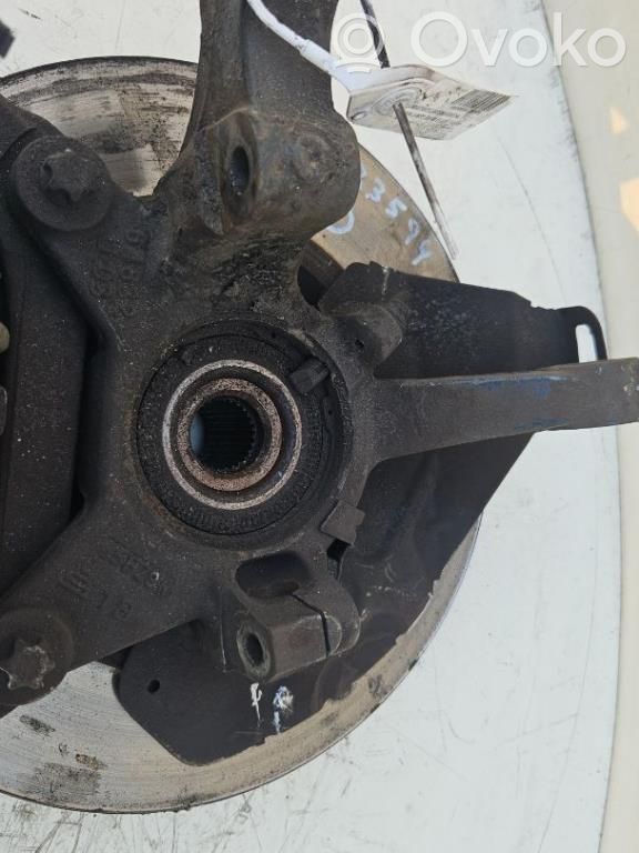 Front wheel hub spindle knuckle