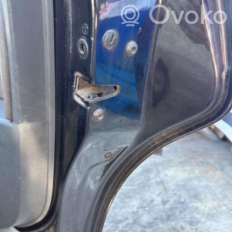 Cerradura de puerta trasera