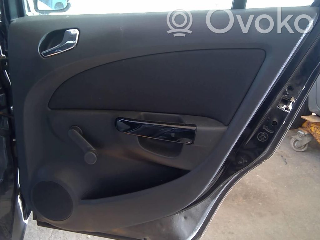 Opel Corsa D Apšuvums aizmugurējām durvīm 