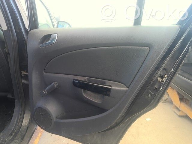 Opel Corsa D Apšuvums aizmugurējām durvīm 