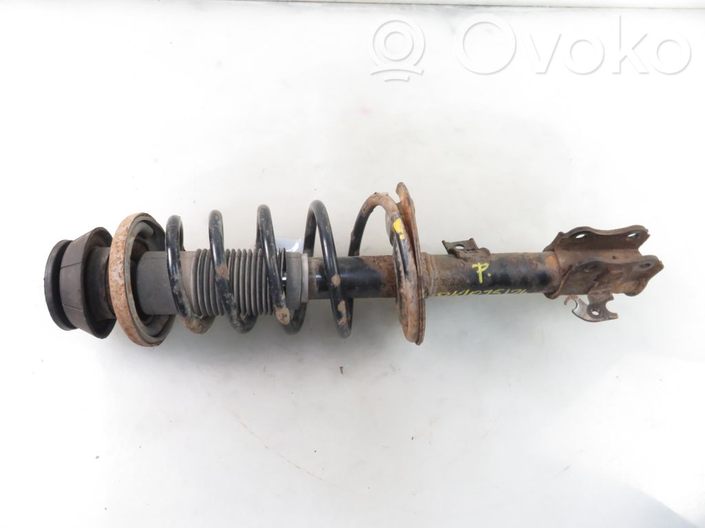 Suzuki Swift I Amortyzator osi przedniej ze sprężyną 