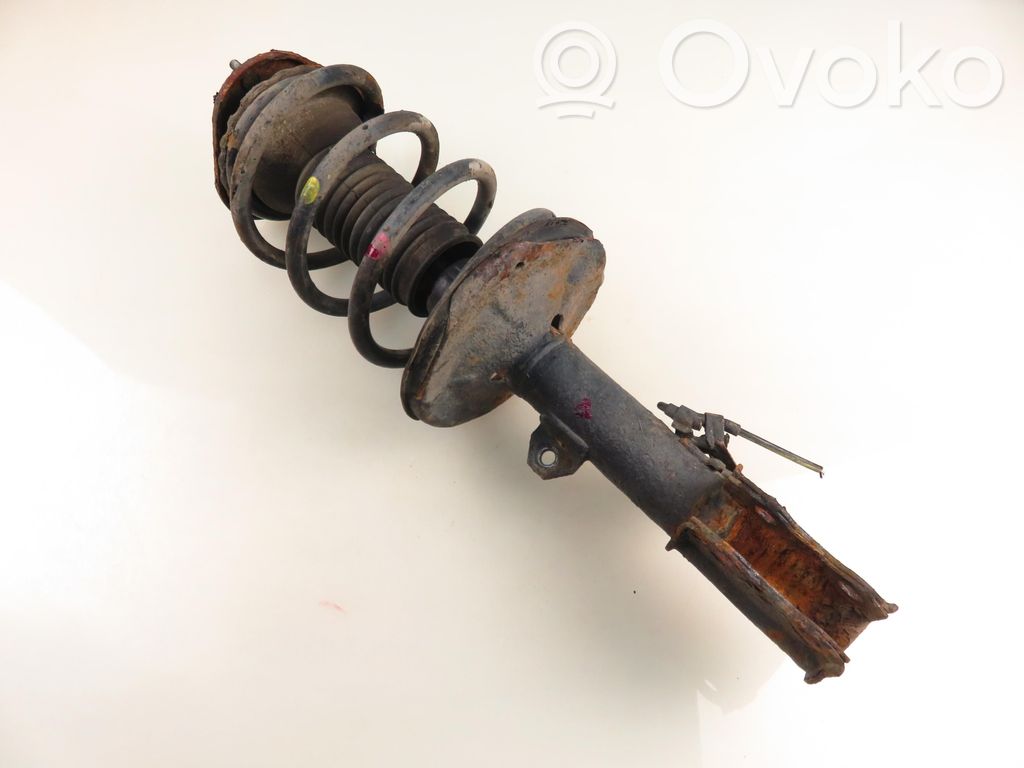 Front shock absorber with coil spring