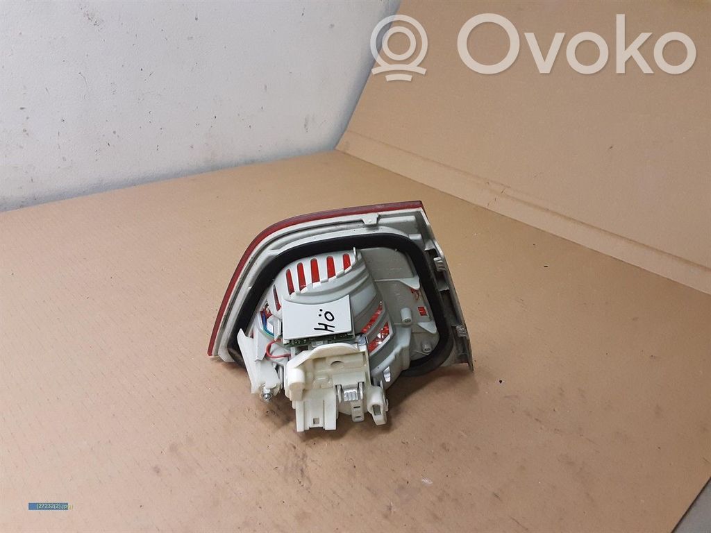 BMW 3 E90 E91 Aizmugurējais lukturis pārsegā 