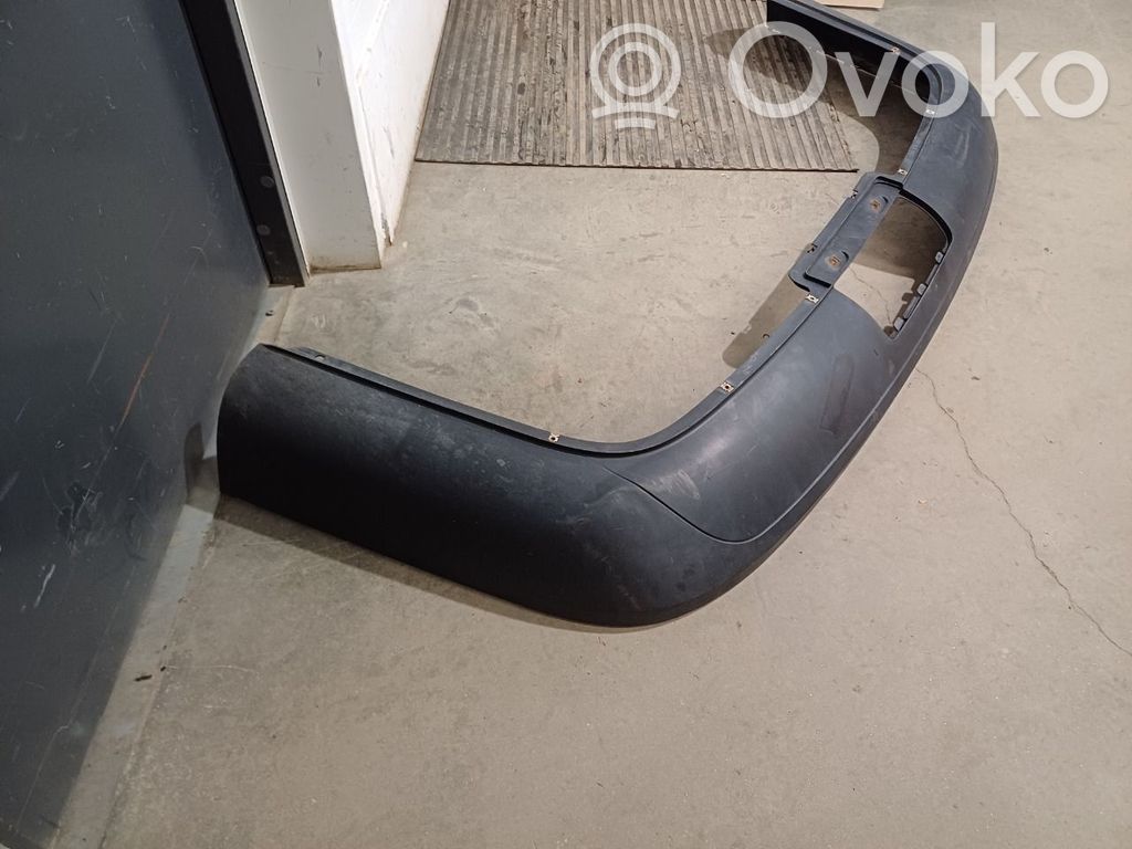 Volkswagen PASSAT B6 Moldura inferior del parachoques trasero 