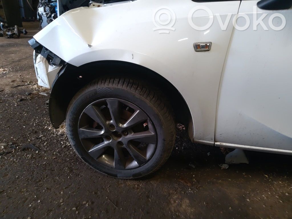 Opel Corsa E Front shock absorber with coil spring 