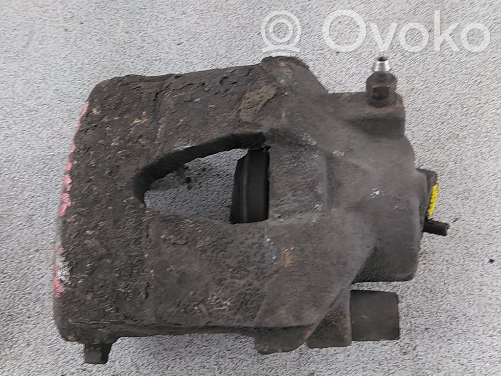 Skoda Fabia Mk2 (5J) Zacisk hamulcowy przedni 