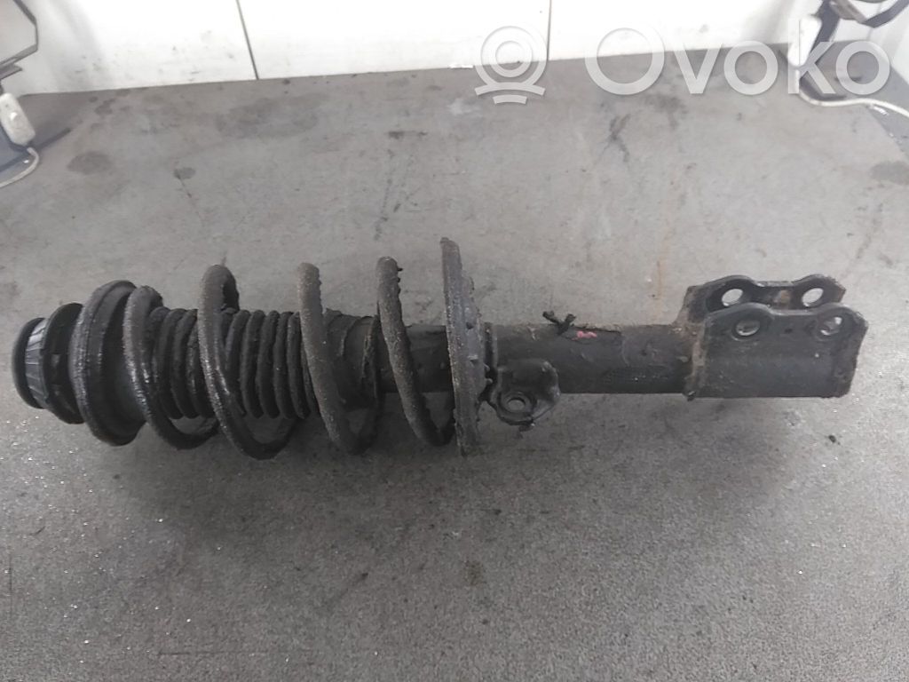 Toyota Yaris Amortyzator osi przedniej ze sprężyną 