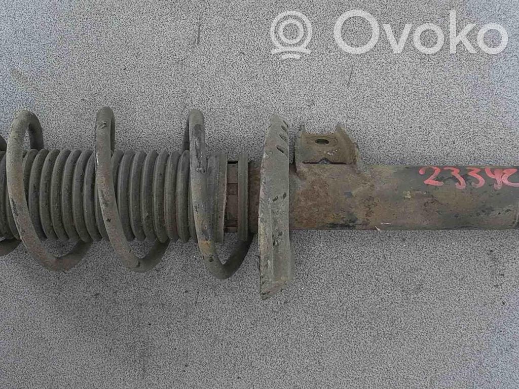 Volkswagen Golf VI Amortyzator osi przedniej ze sprężyną 