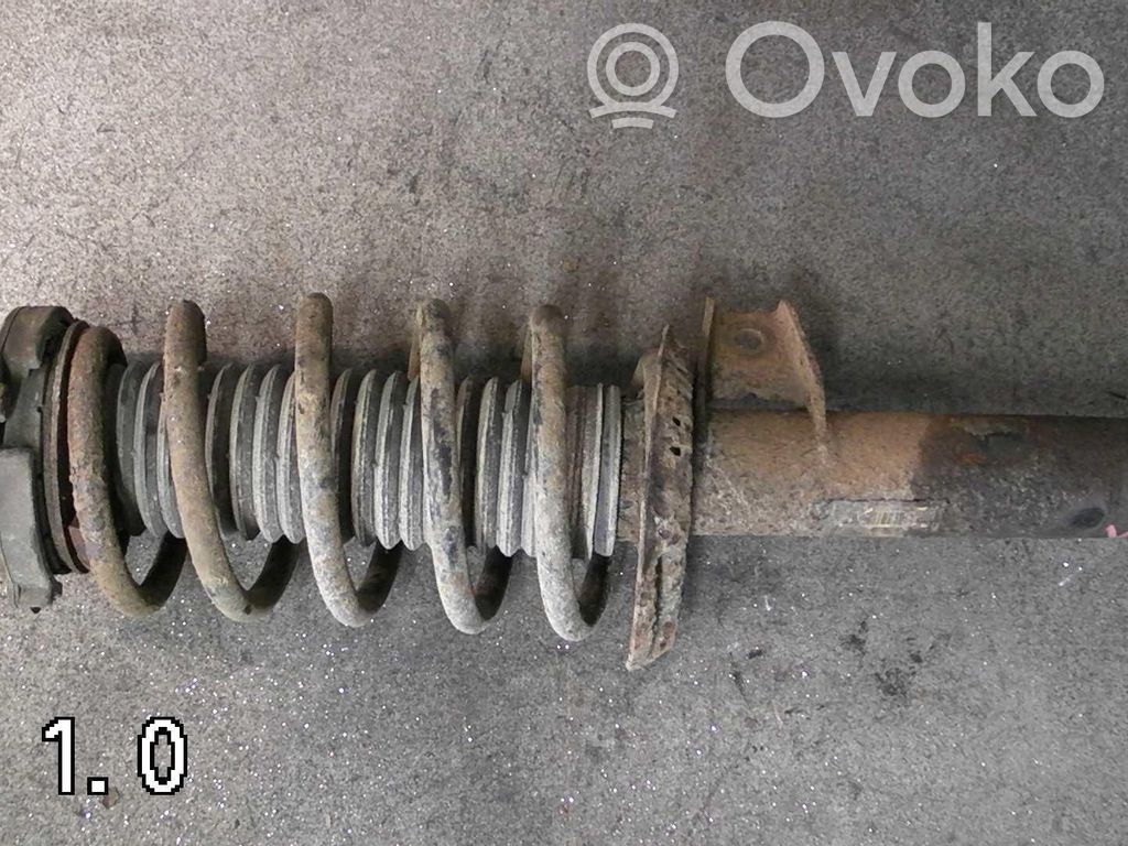 Volkswagen Caddy Front shock absorber with coil spring 