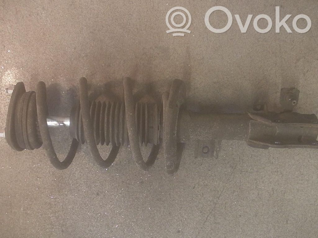 Mazda 3 III Amortyzator osi przedniej ze sprężyną 