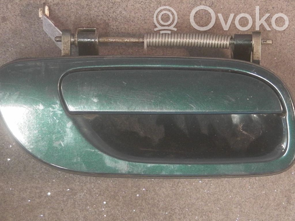Manecilla externa puerta delantera