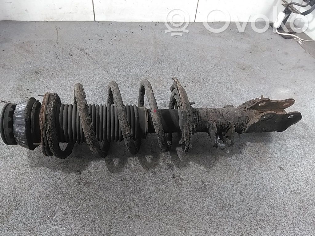 KIA Rio Amortyzator osi przedniej ze sprężyną 