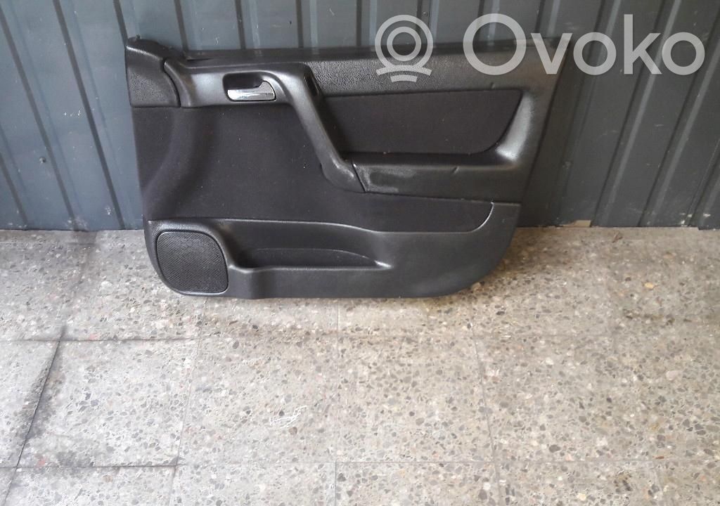 Opel Astra G Boczki / Poszycie drzwi przednich 