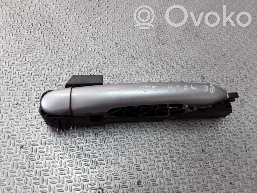 Nissan Primera Manecilla externa puerta trasera 