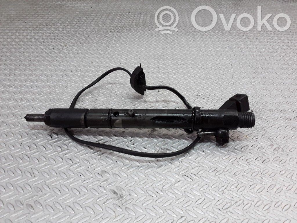 Inyector de combustible   059130202B