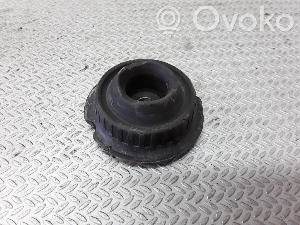Front coil spring rubber mount