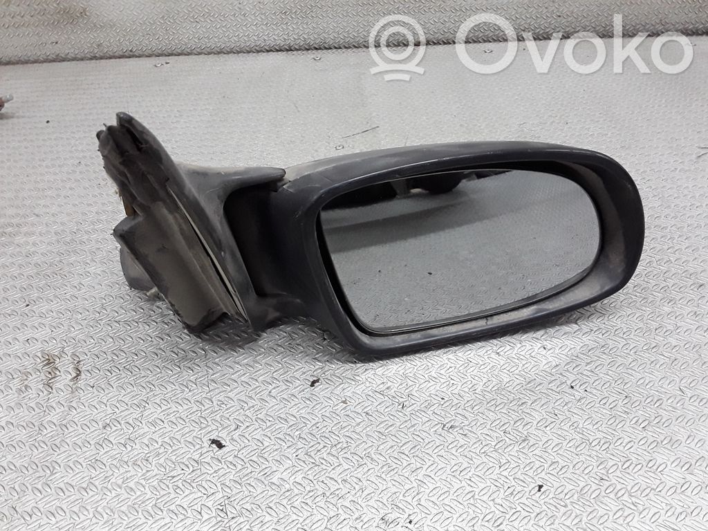 Opel Omega B1 Front door electric wing mirror 