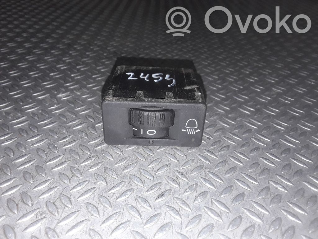 Headlight level height control switch