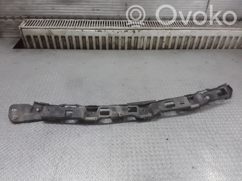 Opel Astra H Uchwyt / Mocowanie zderzaka tylnego 