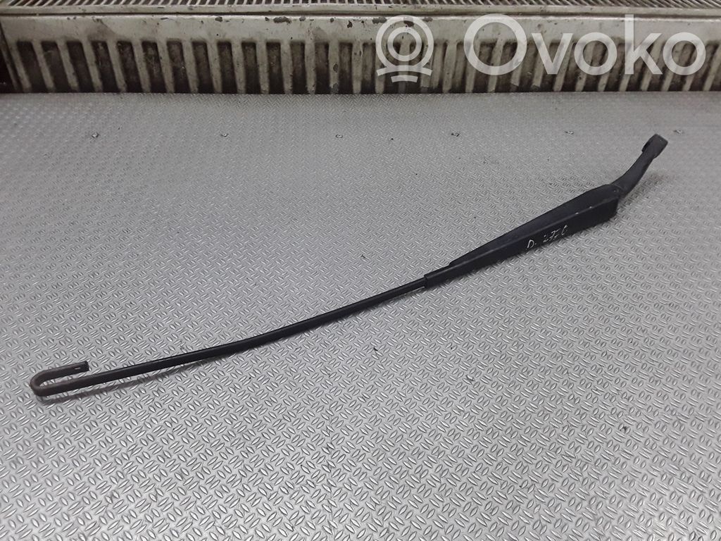 Front wiper blade arm