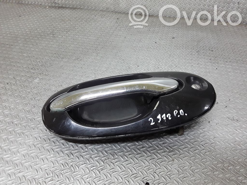 KIA Carnival Manecilla externa puerta delantera 