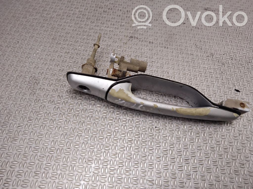 Mitsubishi Grandis Manecilla externa puerta delantera 