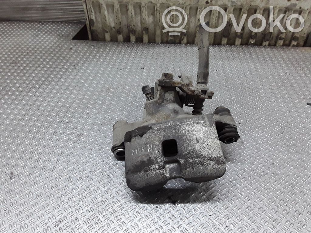 Toyota Corolla E110 Pinza del freno posteriore